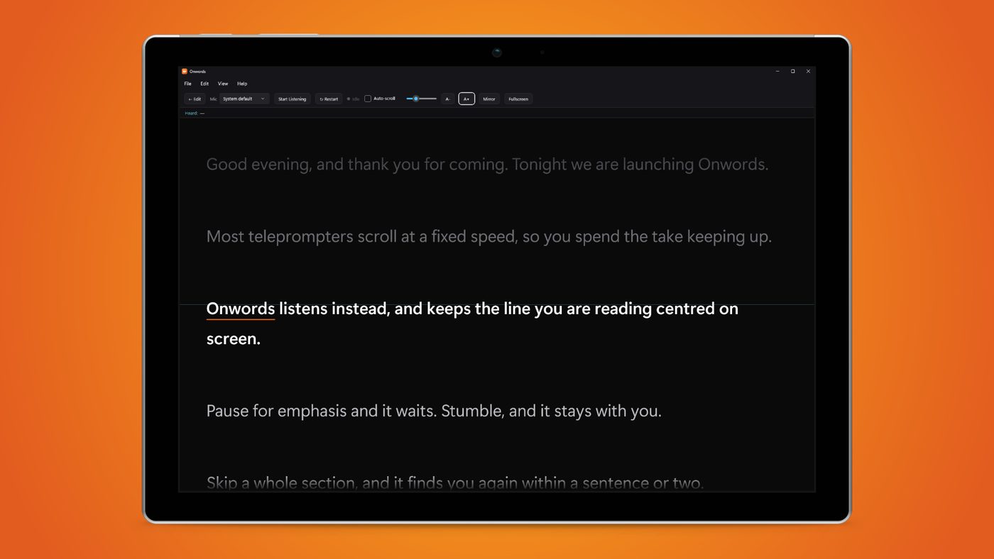 Onwords large type, shown on a Windows tablet against an orange background.